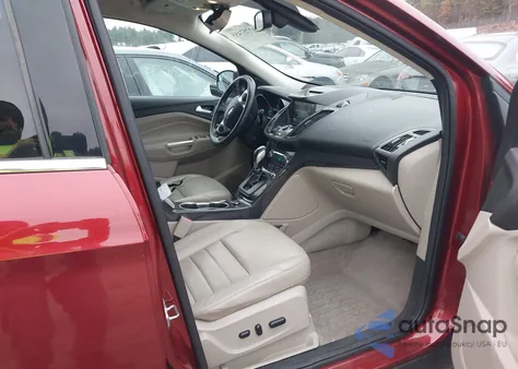 2015 Ford Escape Titanium z USA, uszkodzony, nr VIN 1FMCU9J97FUC14886